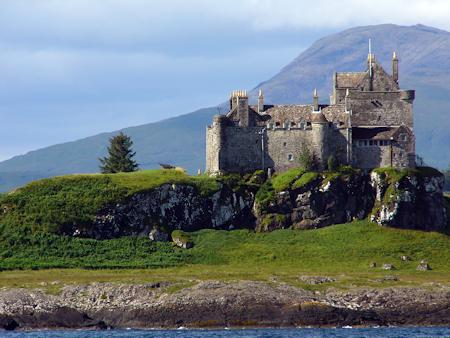 Duart Castle with the crags and shore below
